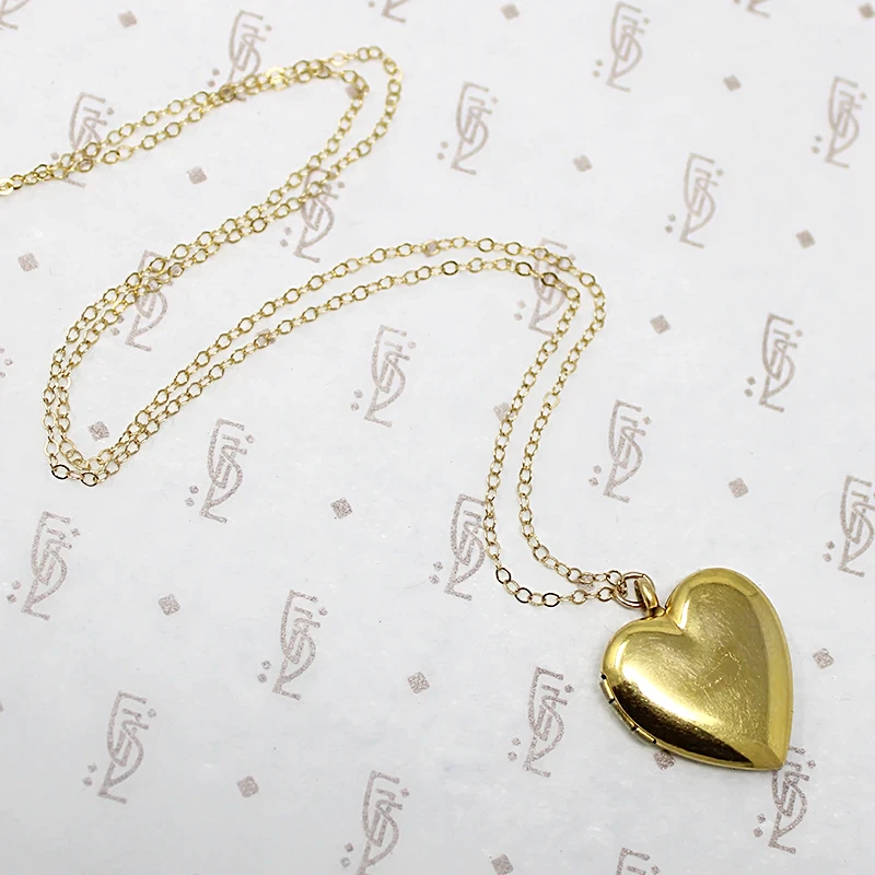 Simple & Sweet Heart-Shaped Locket with Great Photos