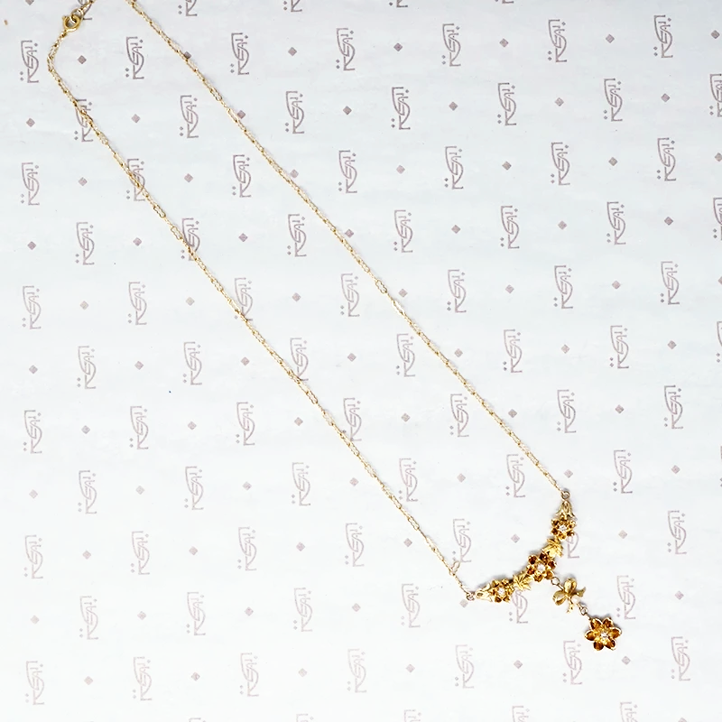 Flowers and Bow Diamonds and Pearl Necklace