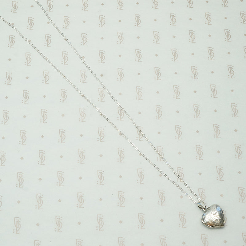 sterling silver engraved heart shaped locket circa 1980