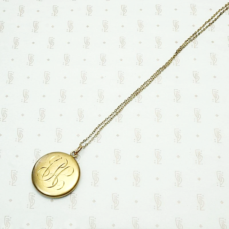 Edwardian Gold Sheeted Locket Engraved with Flowers & Feathers