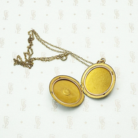 Edwardian Gold Sheeted Locket Engraved with Flowers & Feathers