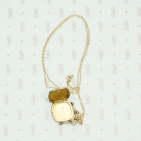 Art Nouveau W&H Co. Gold Filled Locket, interior view.