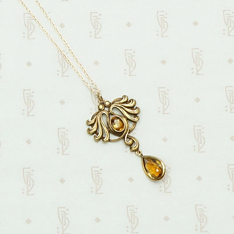 Art Nouveau Citrine and Flowing Gold Pendant