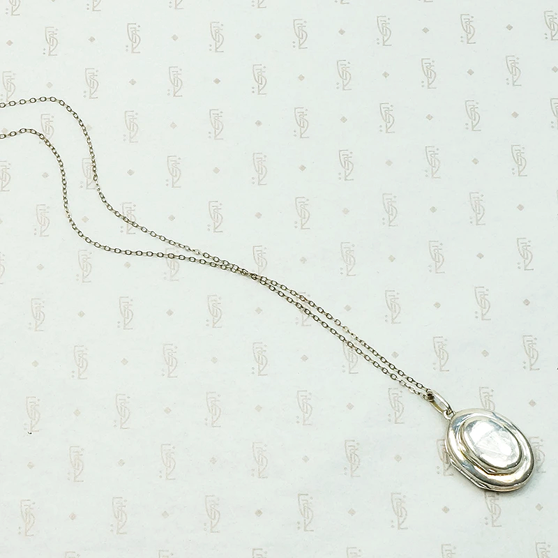 Vintage Double Sided Oval Sterling Locket