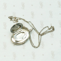 Vintage Double Sided Oval Sterling Locket