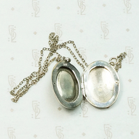 Vintage Double Sided Oval Sterling Locket