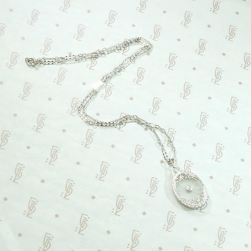 Delicate Filigreed Camphor Glass Necklace