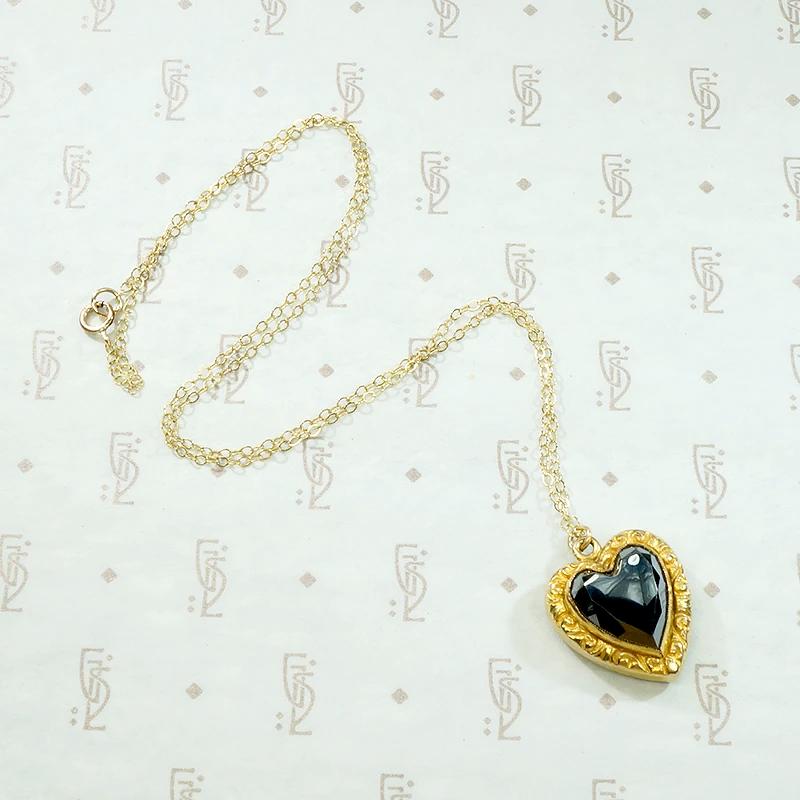 Pretty Faceted Hematite Heart Pendant