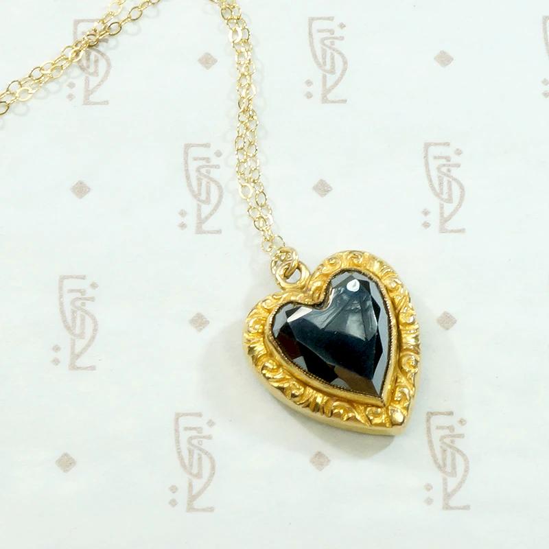 Pretty Faceted Hematite Heart Pendant