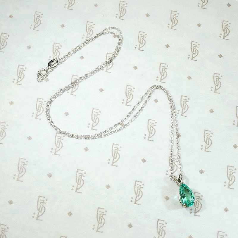 Verdant Pear Cut Emerald Pendant in White Gold