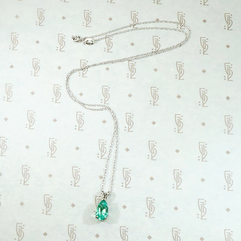 Verdant Pear Cut Emerald Pendant in White Gold