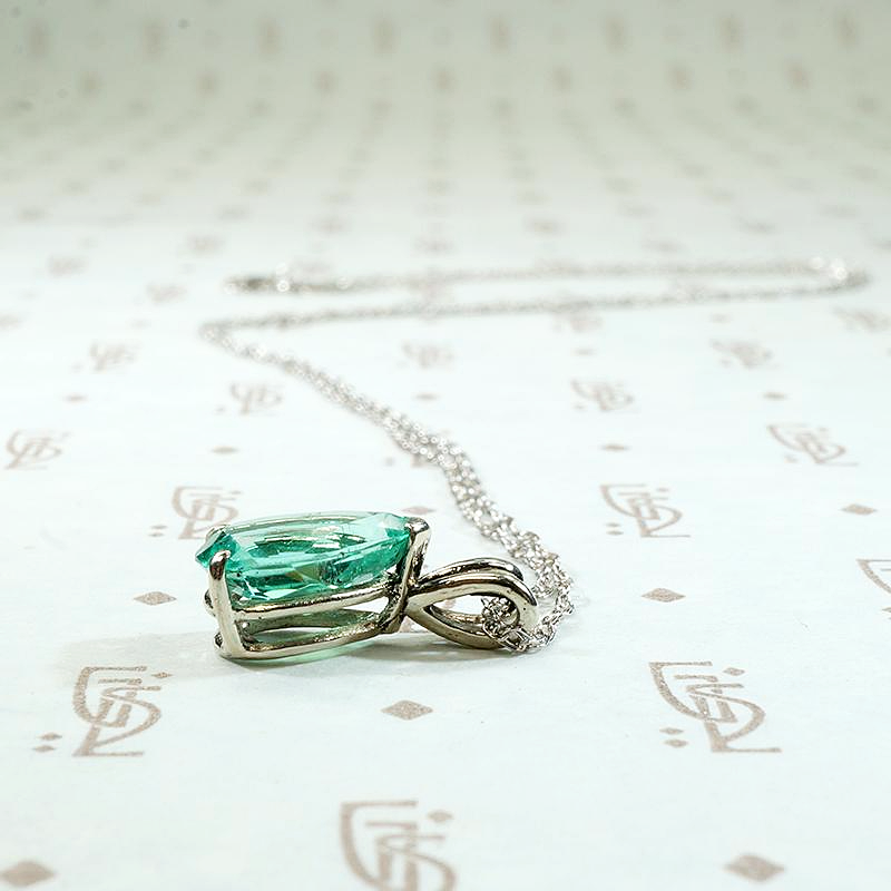 Verdant Pear Cut Emerald Pendant in White Gold