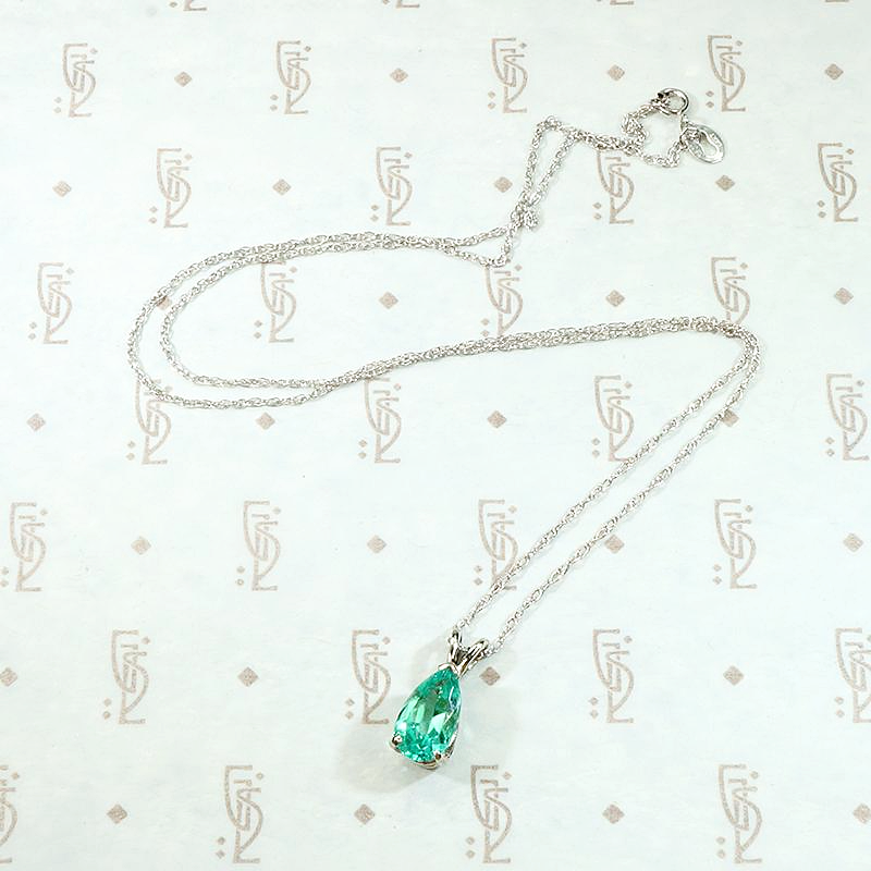 Verdant Pear Cut Emerald Pendant in White Gold