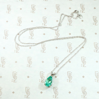 Verdant Pear Cut Emerald Pendant in White Gold