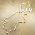 Long Angel Skin Beads with Gold Clasp