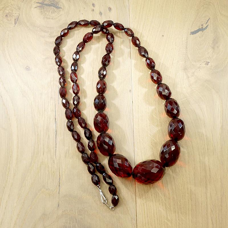 Strand of Large Faceted Amber Barrel Beads