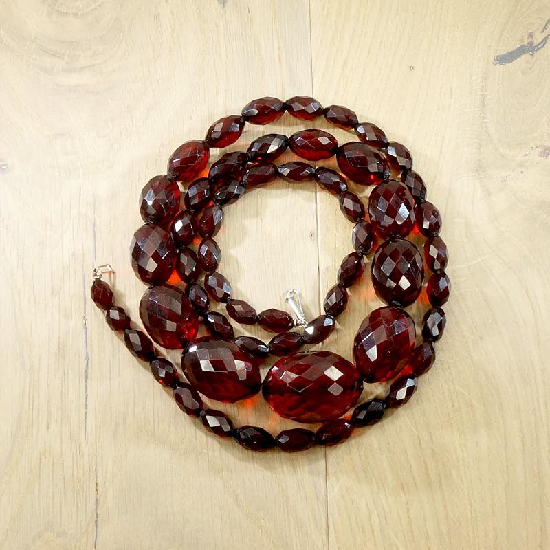 Strand of Large Faceted Amber Barrel Beads