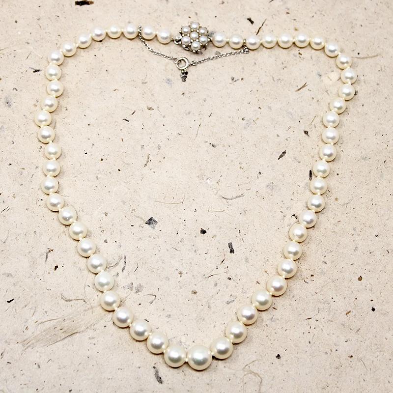Choker of Graduated Pearls with Flower Clasp
