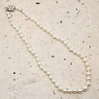 Choker of Graduated Pearls with Flower Clasp