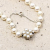 Choker of Graduated Pearls with Flower Clasp