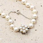 Choker of Graduated Pearls with Flower Clasp