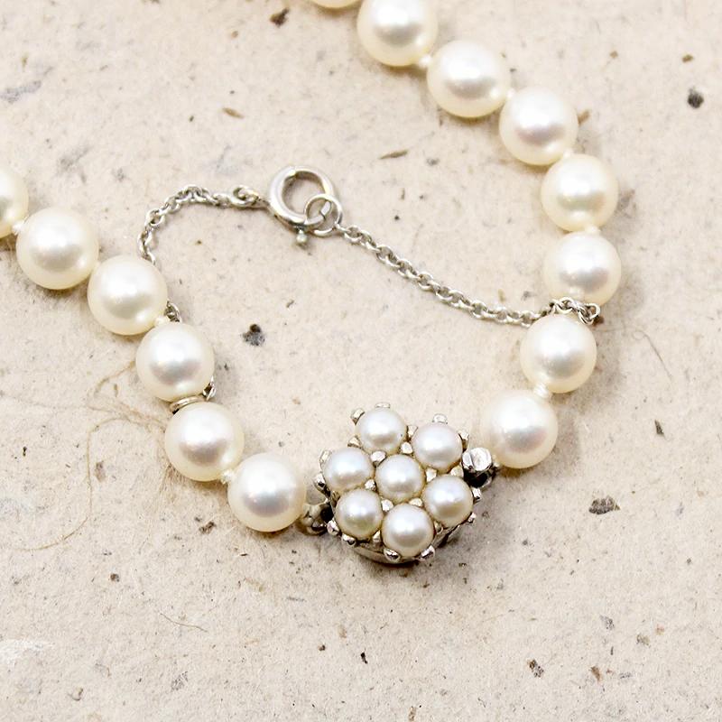 Choker of Graduated Pearls with Flower Clasp