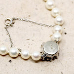 Choker of Graduated Pearls with Flower Clasp