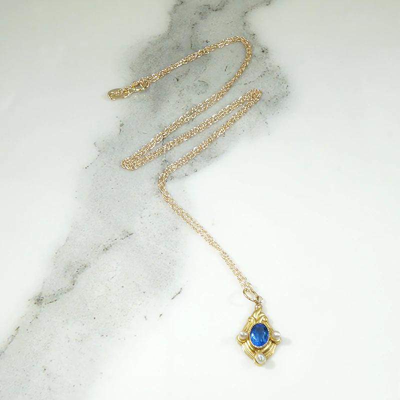 Intense Blue Sapphire Pendant with Pearls