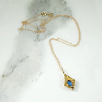 Intense Blue Sapphire Pendant with Pearls