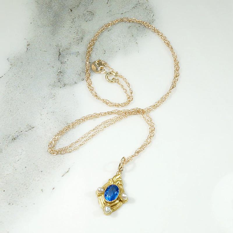 Intense Blue Sapphire Pendant with Pearls