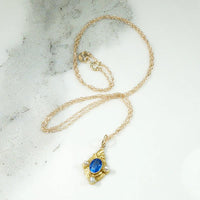 Intense Blue Sapphire Pendant with Pearls