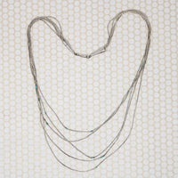 Slinky Liquid Silver Necklace with Turquoise Beads