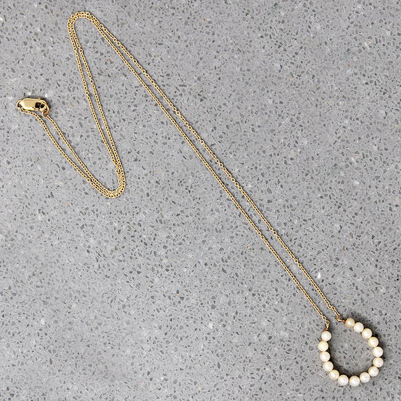 Fortuitous Pearl-Set Gold Horseshoe Pendant