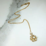 Cheerful Lacy Gold & Opal Flower Pendant