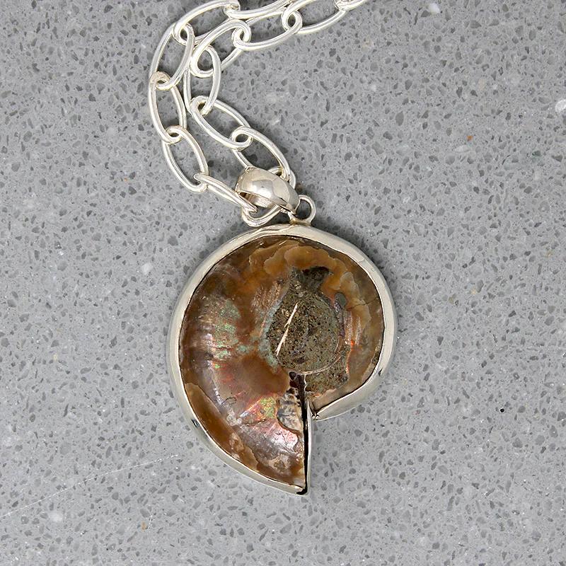 Pearlescent Ammonite Fossil in Sterling Pendant