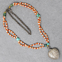 Chinese Repoussé Silver Heart Pendant on Beads