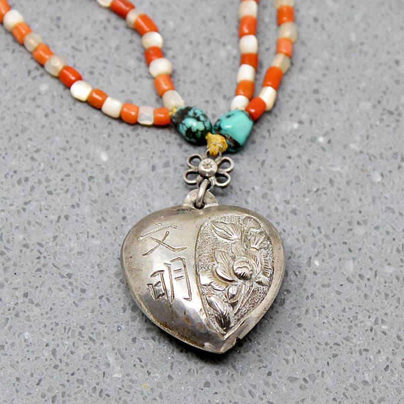 Chinese Repoussé Silver Heart Pendant on Beads