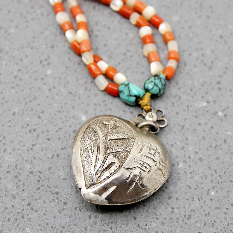 Chinese Repoussé Silver Heart Pendant on Beads