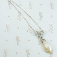 Natural Pearl Platinum and Diamond Pendant