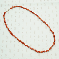 Deep Red Antique Coral Beads on Silk