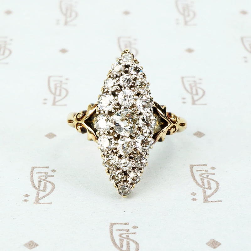 marquis shaped old mine cut diamond cluster ring