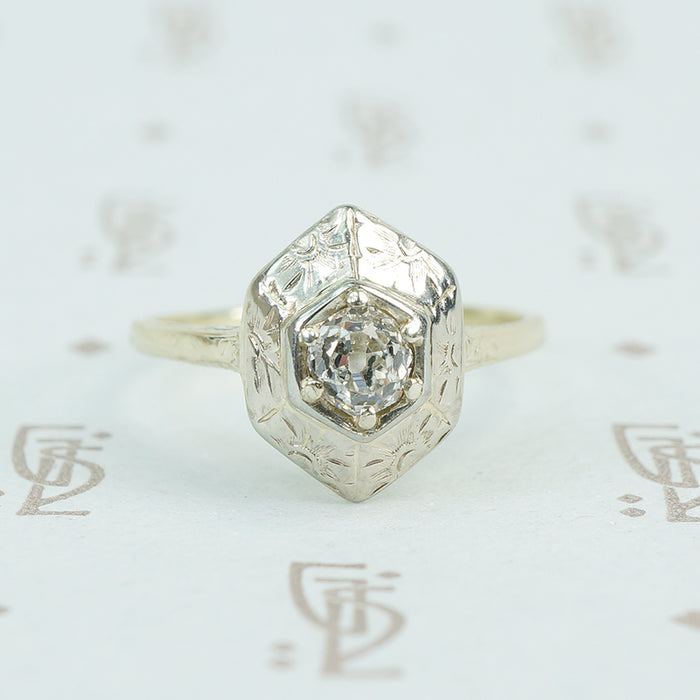 Engraved white and green gold omc engagement ring