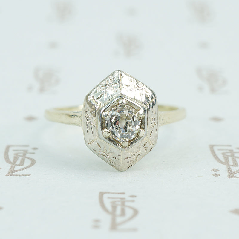 Engraved white and green gold omc engagement ring