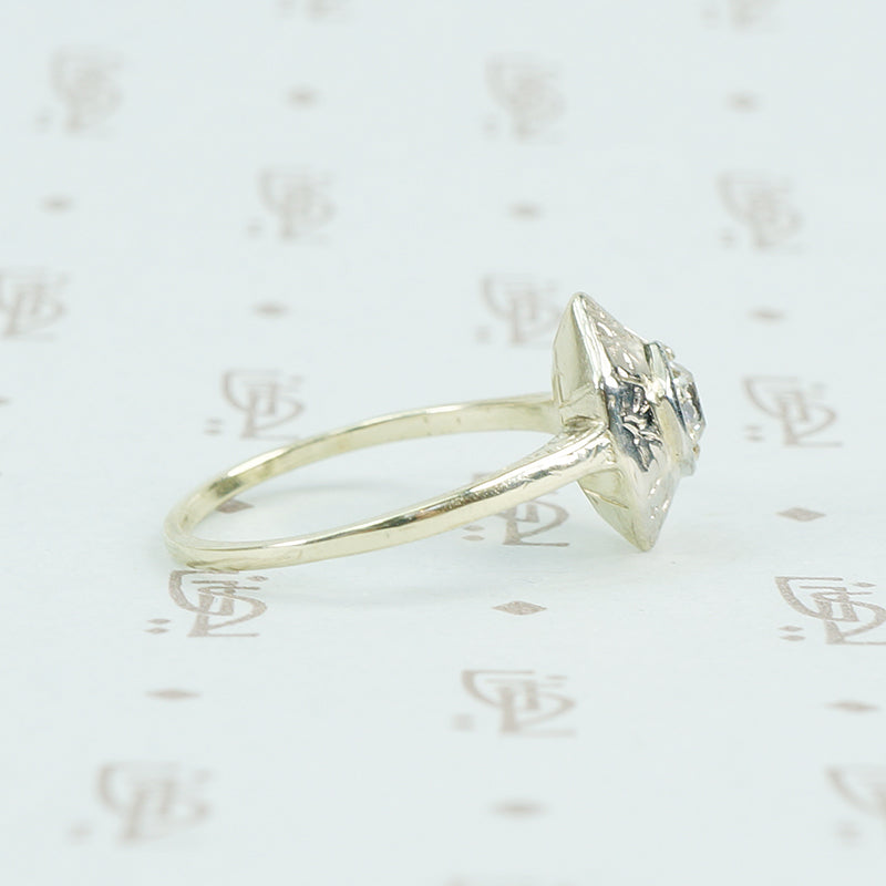 Engraved white and green gold omc engagement ring