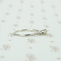 engraved forget me not white gold solitaire omc diamond ring side