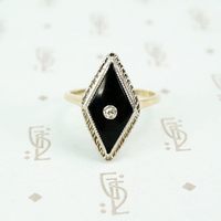 2 tone gold onyx and diamond ring