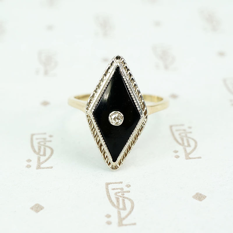 2 tone gold onyx and diamond ring