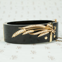 onyx bangle bracelet with a gold and pearl sheaf of wheat antique