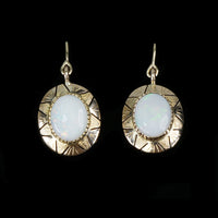 vintage opal earrings in 14k yellow gold with south american sun design
