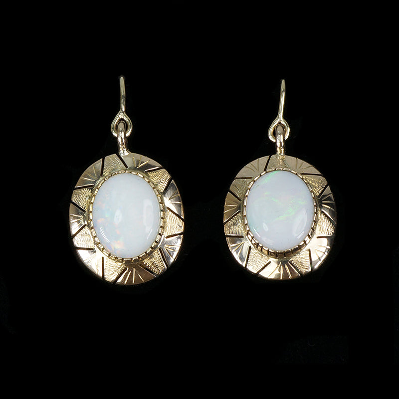 vintage opal earrings in 14k yellow gold with south american sun design